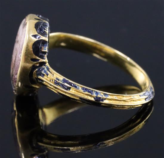 A rare mid 17th century enamelled gold oval memorial ring for Charles I (1600-1649), finger size K.